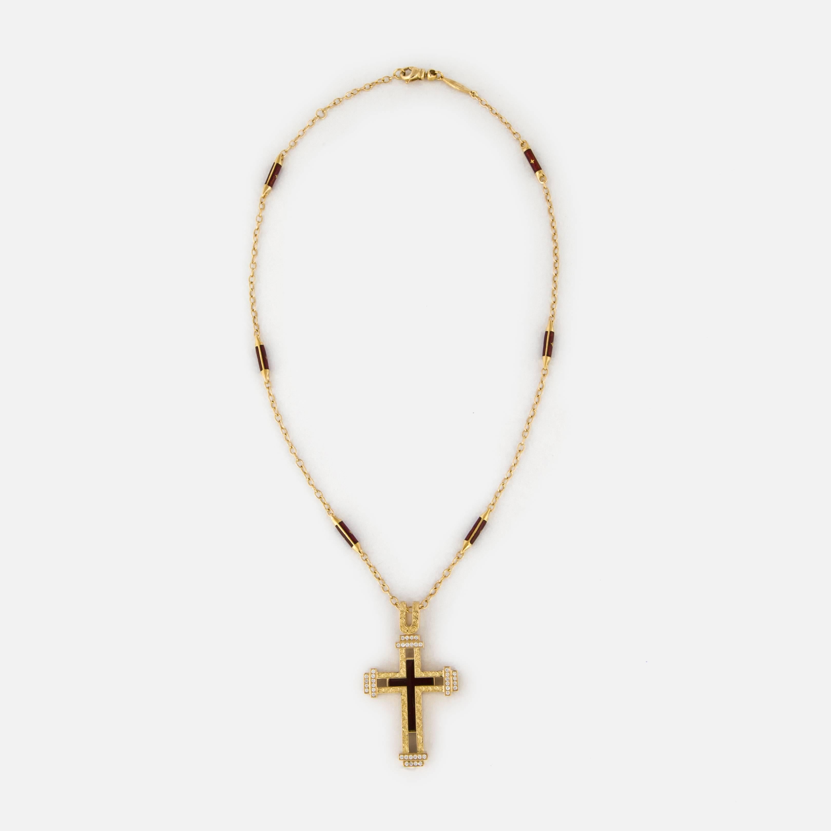 Beautiful yellow gold cross pendant and chain marked 