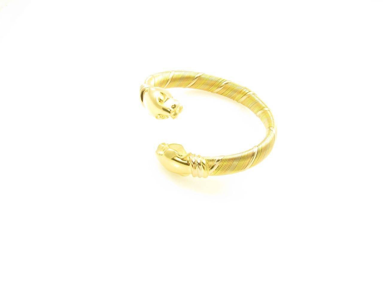 Cartier Tricolor Gold Double Headed Panthere Bangle Bracelet In Good Condition In New York, NY