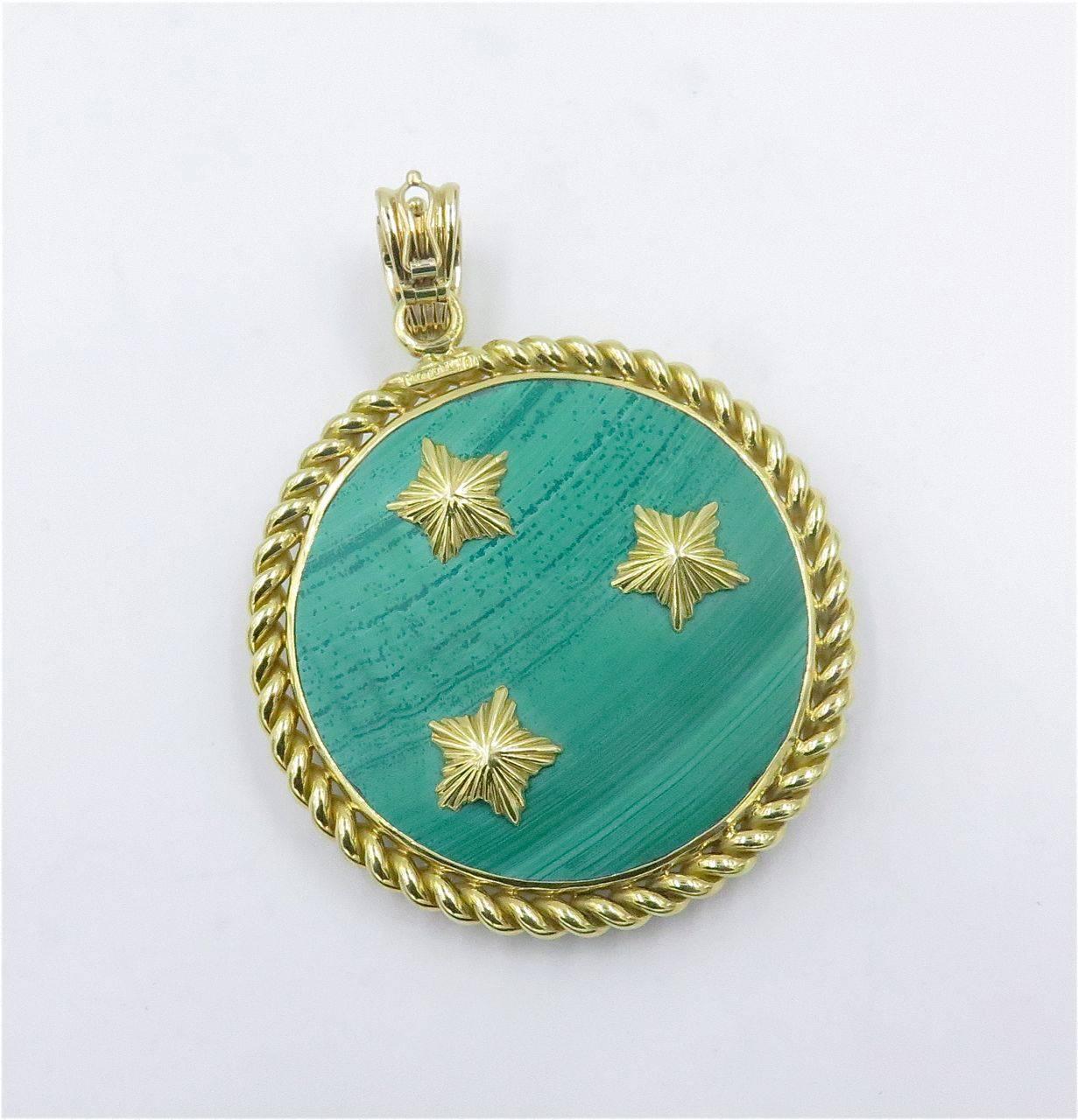 An 18 karat yellow gold and malachite and diamond 