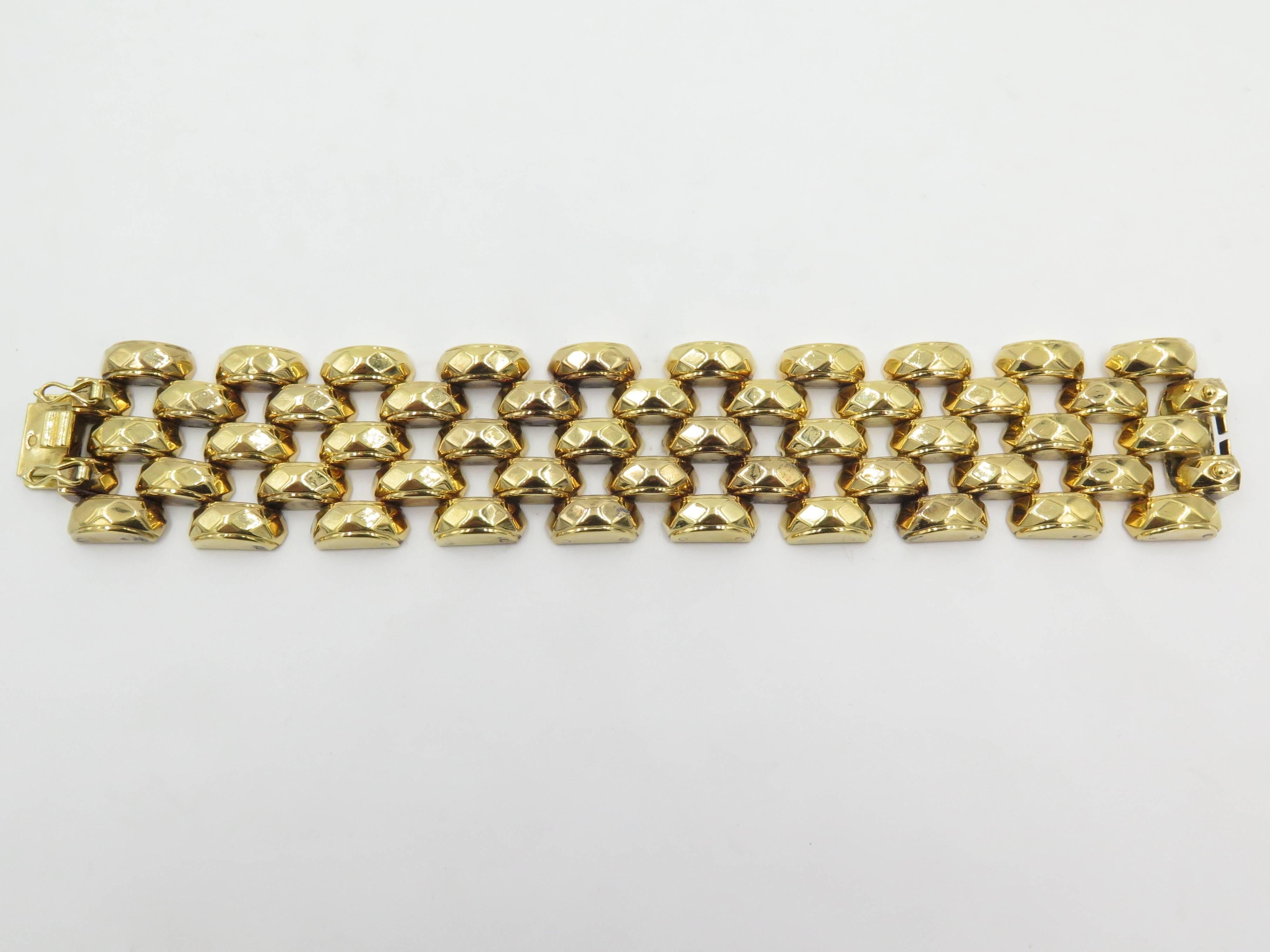 An 18 karat rose gold bracelet. Designed as a hammered gold brick link. Width is approximately 1 1/2 inches. Length is approximately 7 3/4 inches. Gross weight is approximately 103.9 grams. 