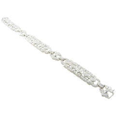 A Beautiful Art Deco Platinum and Diamond Bracelet. A Beautiful Art Deco Platinum and Diamond Bracelet.