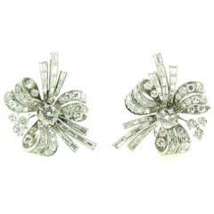 A Pair of Art Deco Platinum and Diamond Earrings.