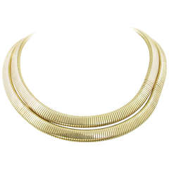 A Fabulous Yellow Gold Double Tubogas Necklace.