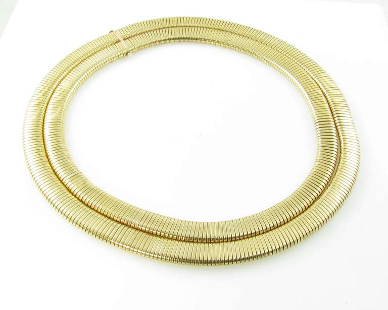 A 14 karat yellow gold double tubogas necklace.  Circa 1940’s.  The necklace has a gross weight of approximately 152.4 grams and measures 18 1/4 inches long.