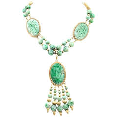 A Beautiful Carved Jadeite Necklace.