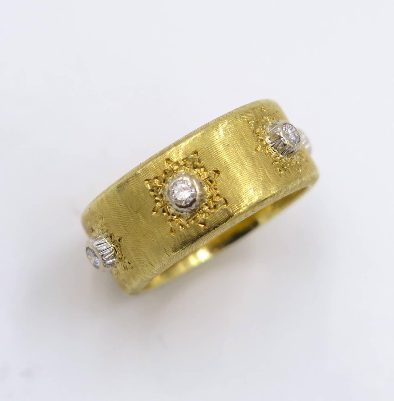 An 18 karat yellow gold and diamond “Classica” ring, Buccellati. The ring has a gross weight of 7.2 grams and is a size 6.  With original box.