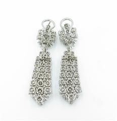 Van Cleef & Arpels "A Cheval" Diamond Platinum Dangle Earrings