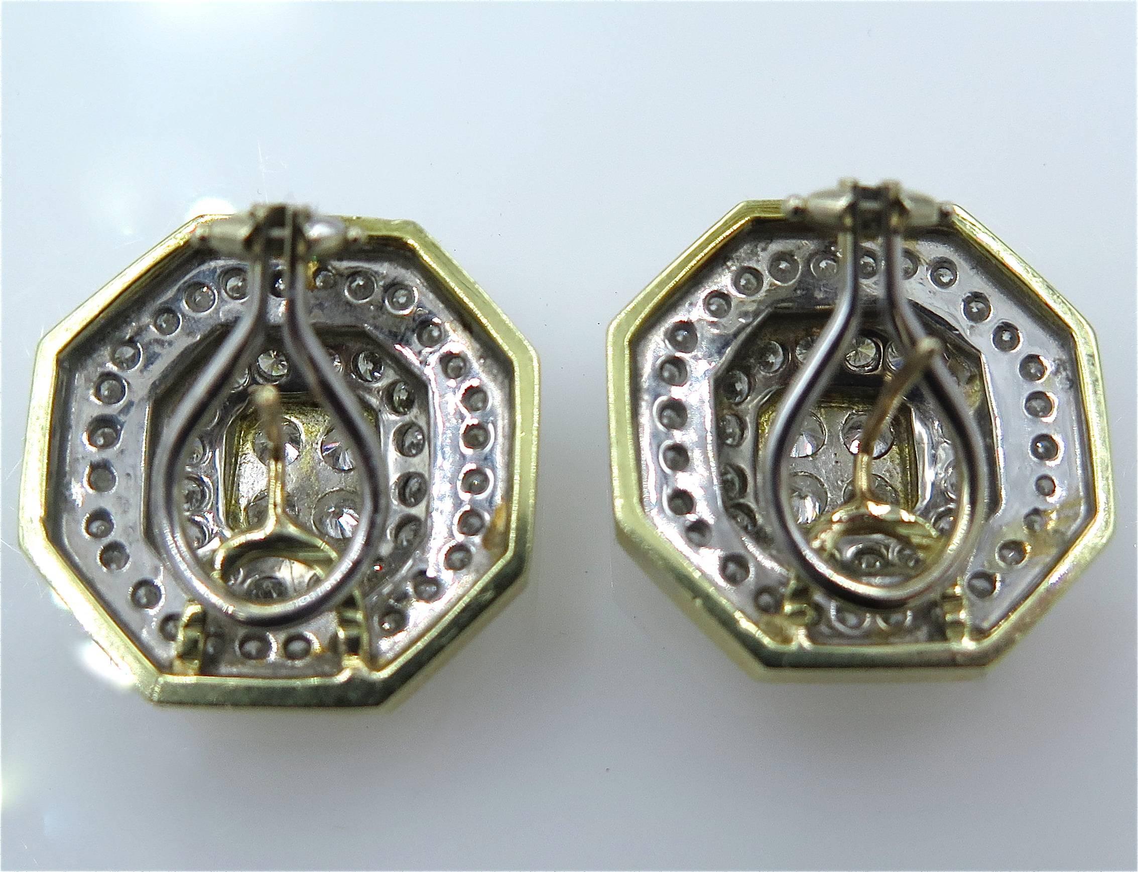 A pair of 14 karat yellow gold and diamond earrings. Each designed as a octagonal-shaped geometric plaque, set with pavé-set diamonds. (98) round brilliant-cut diamonds weigh approximately 4.00 carats. Diameter is 3/4 inches. Gross weight is
