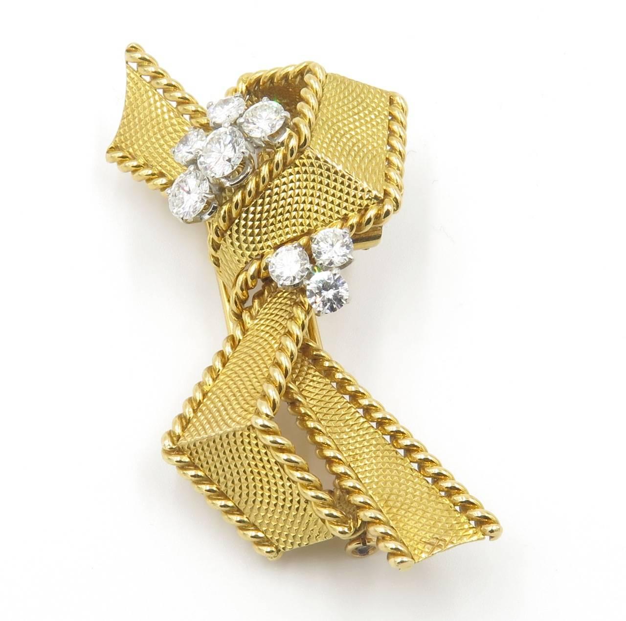 Mauboussin Paris Diamond Textured Gold Ribbon Brooch In Excellent Condition In New York, NY