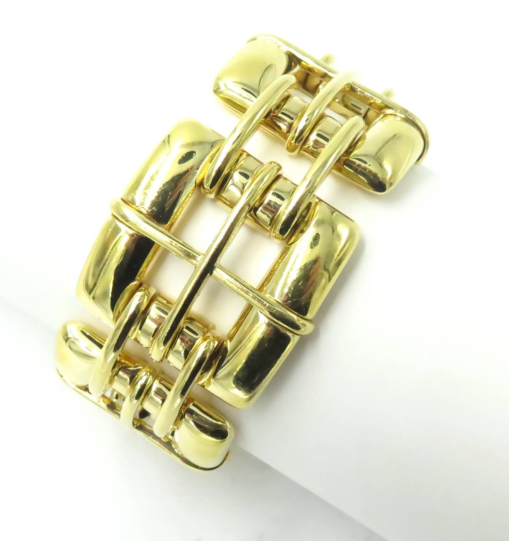 A 18 karat yellow gold bracelet, Tiffany & Co. Designed as a line of polished gold rectangular links of windowpane design. Length is approximately 7 1/2 inches. Gross weight is approximately 118.1 grams. Stamped © 2001, Tiffany & Co., 750, Italy. 