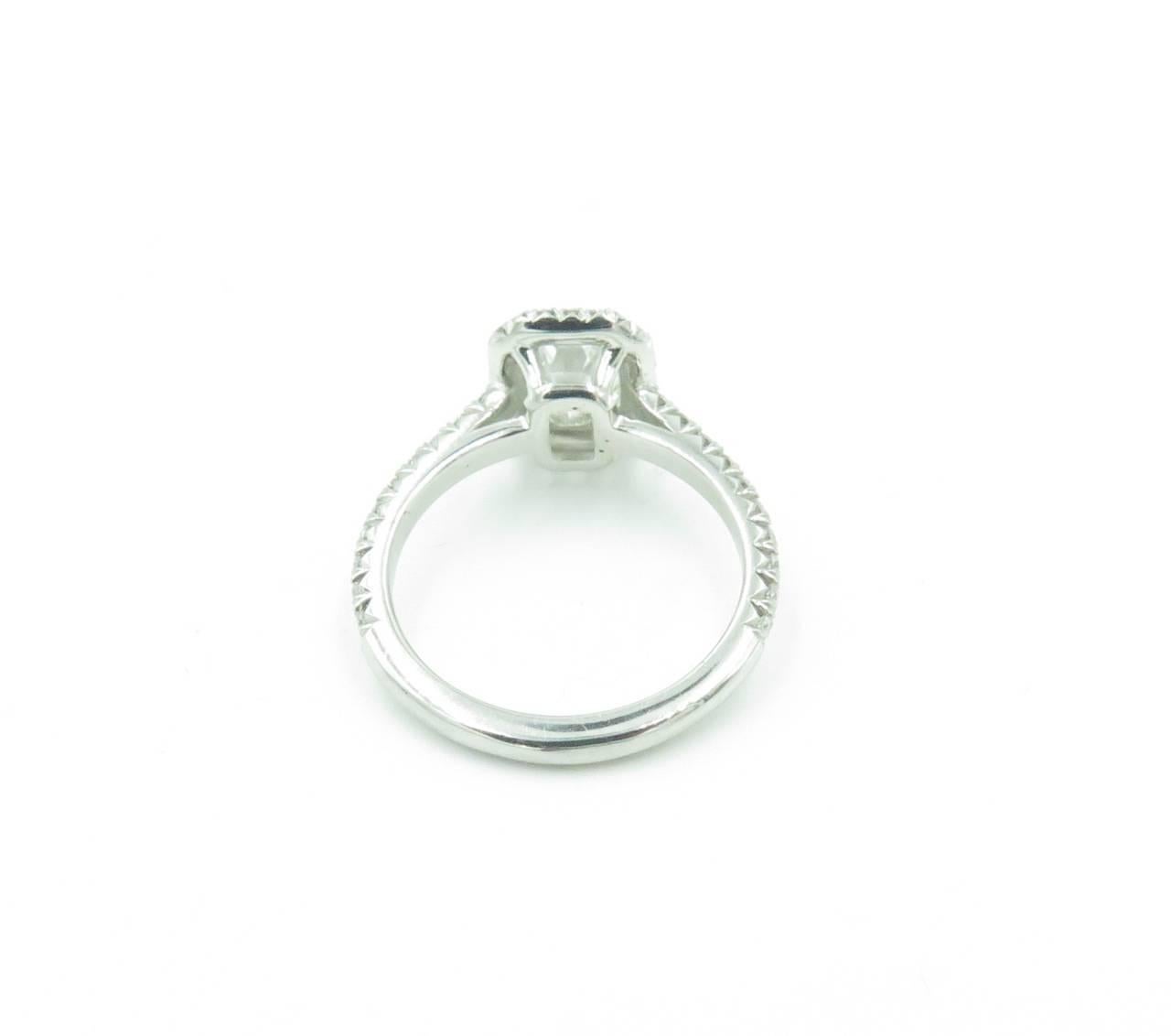 Women's or Men's Gorgeous Emerald Cut Diamond Platinum Engagement Ring.
