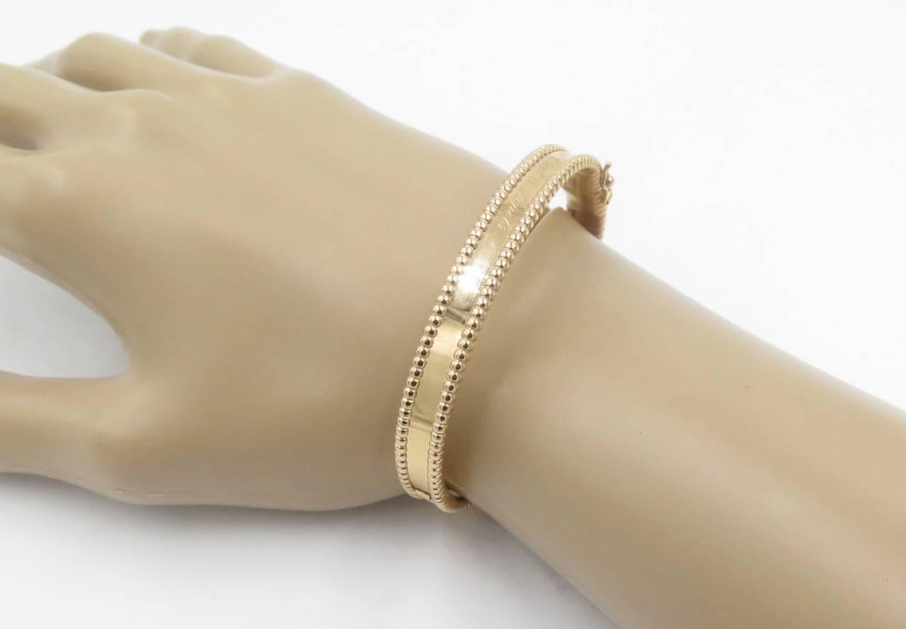 Van Cleef & Arpels Gold Perlee Signature Bangle Bracelet In Excellent Condition In New York, NY