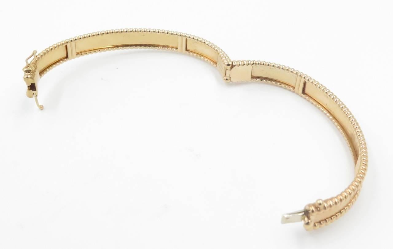 Women's or Men's Van Cleef & Arpels Gold Perlee Signature Bangle Bracelet