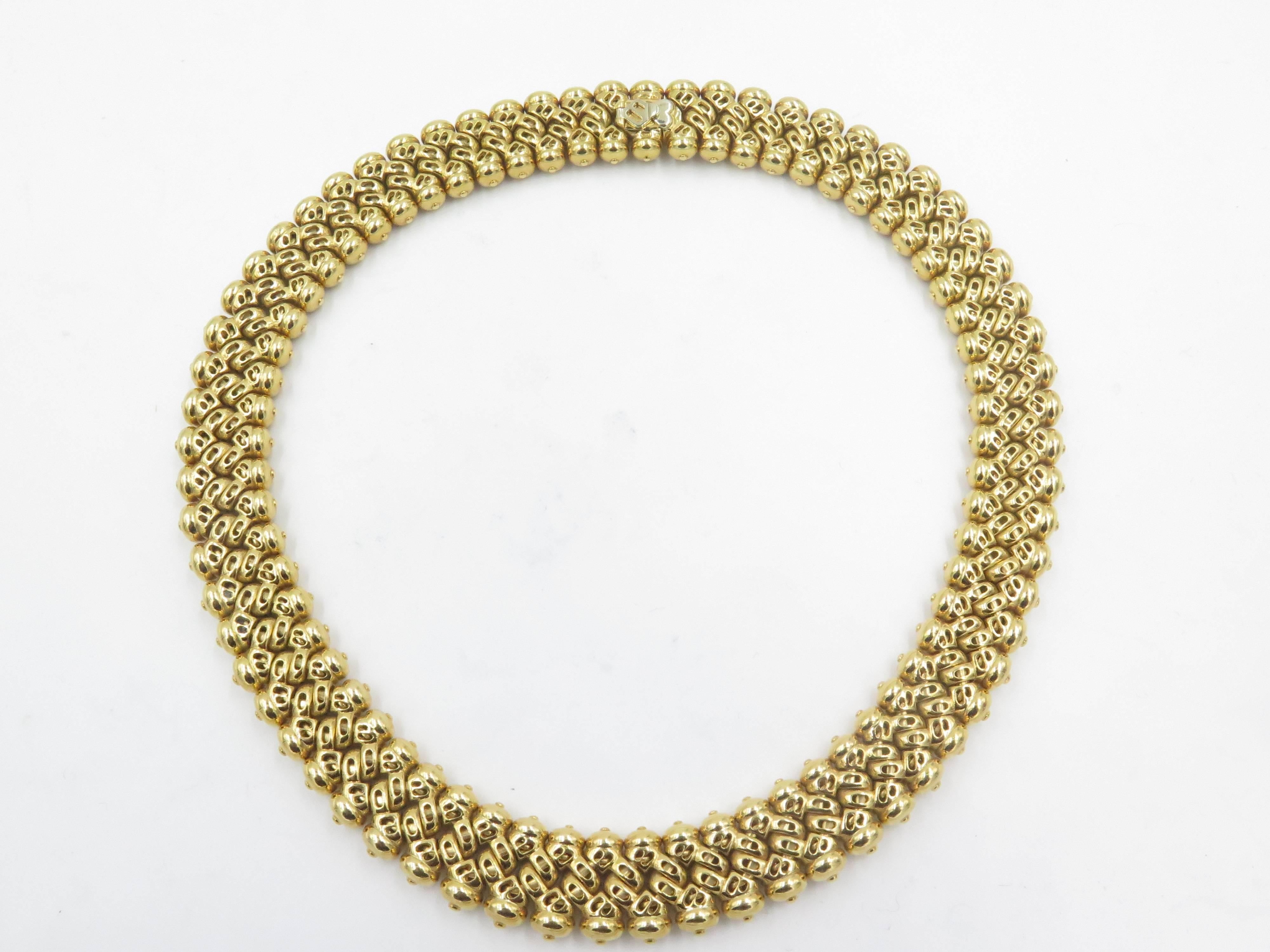 An 18 karat yellow gold and diamond necklace. Bulgari. Designed as twisted gold links enhanced by pave set diamonds.  660 diamonds. Gross weight is approximately 190.9 grams. Length is approximately 15 1/2 inches.
 