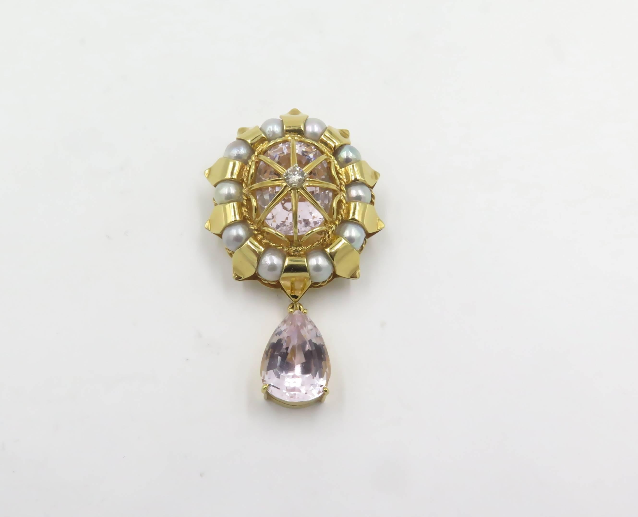 An 18 karat yellow gold, cultured pearl, Kunzite and diamond brooch.  Signed Tony Duquette.  With bail, can be worn as a pendant. Length is approximately 2 1/4 inches. Gross weight is approximately 29.1 grams.