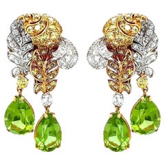 Verdura 1960 Orecchini con diamante peridoto doppio "Plume"