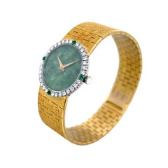 Piaget-Uhr aus Gold mit Diamanten und Smaragden sowie einem Zifferblatt aus Jade