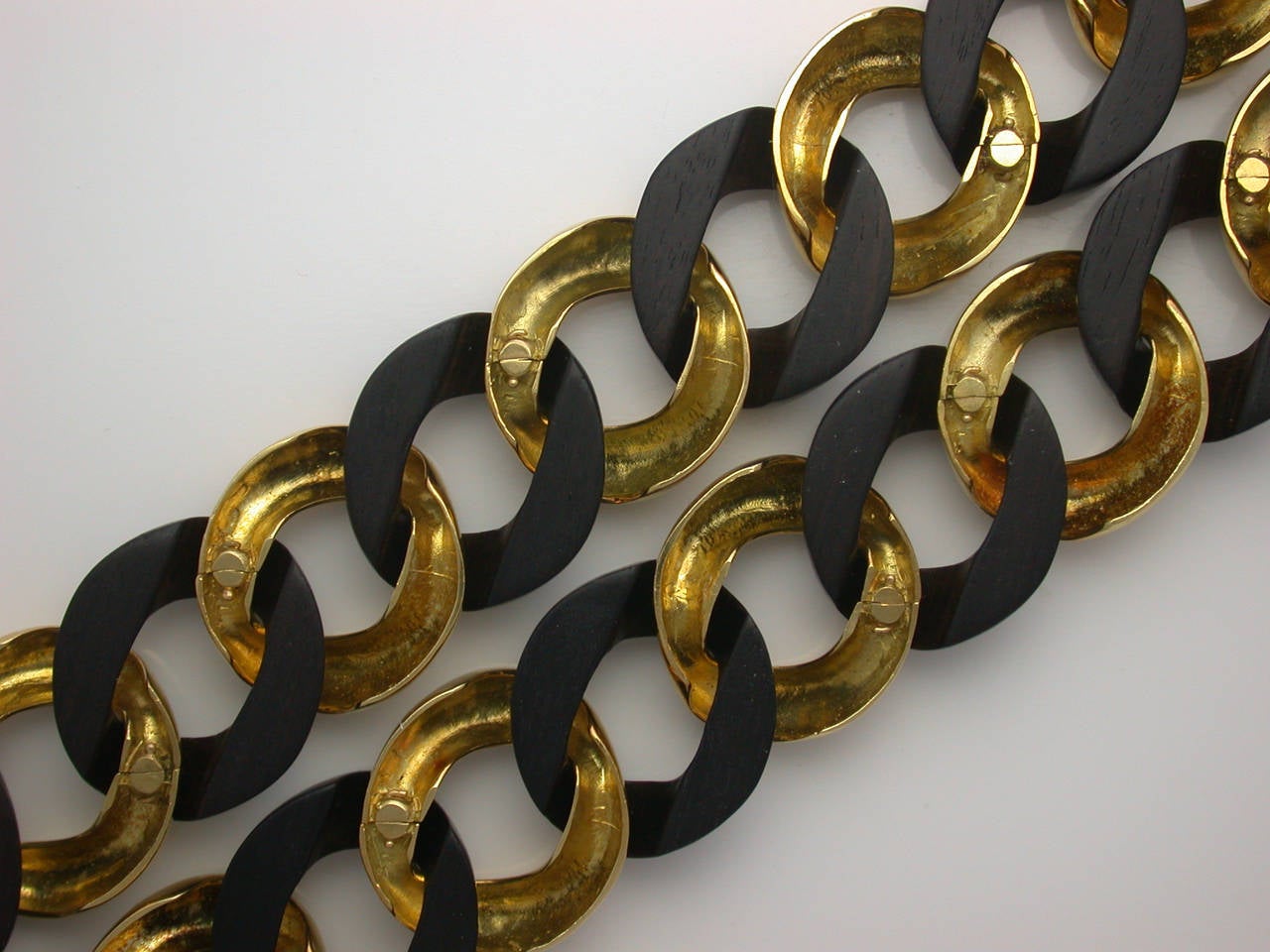 A Pair of Seaman Schepps Rosewood Gold Link Bracelets In Excellent Condition In New York, NY