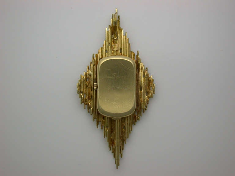 Grima Designed Omega Lady's Yellow Gold Pendant Watch circa 1970s In Excellent Condition In New York, NY