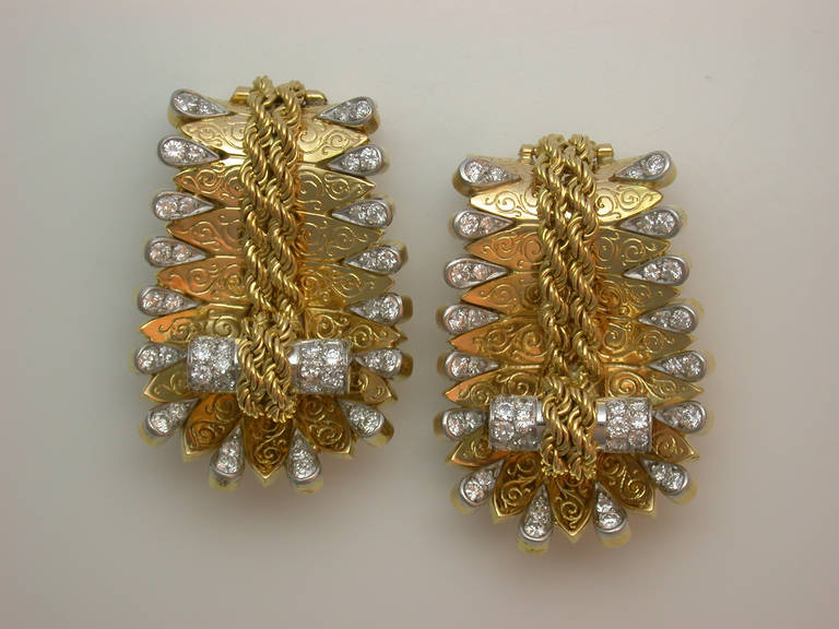 The rare set of four yellow gold and diamond dress clips, two pairs, in a 