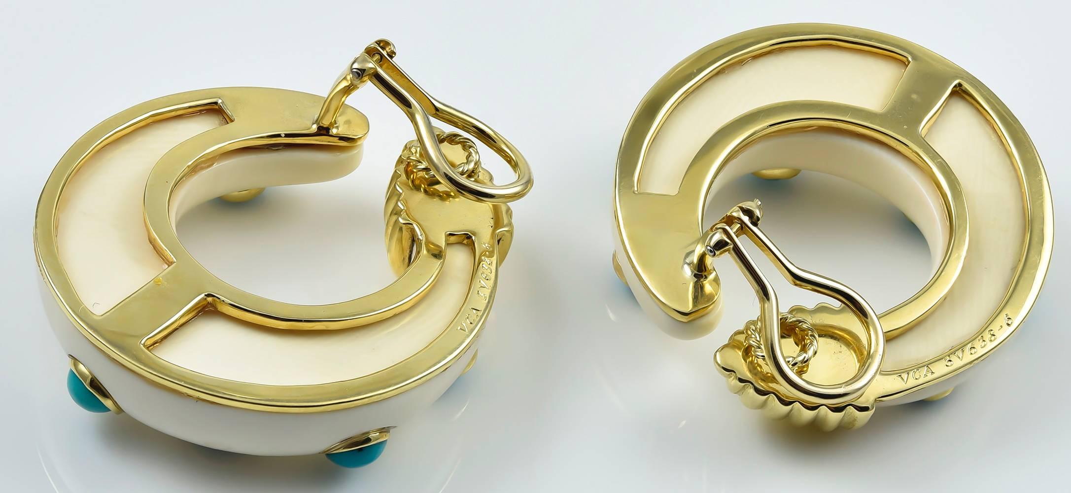 Creole hoop earclips designed as polished yellow gold beehive motifs clipped to the ear, extending sweeping arcs of white hard stone studded with turquoise cabochons set in gold bezels, signed VCA for Van Cleef & Arpels New York, numbered 3V638-6,