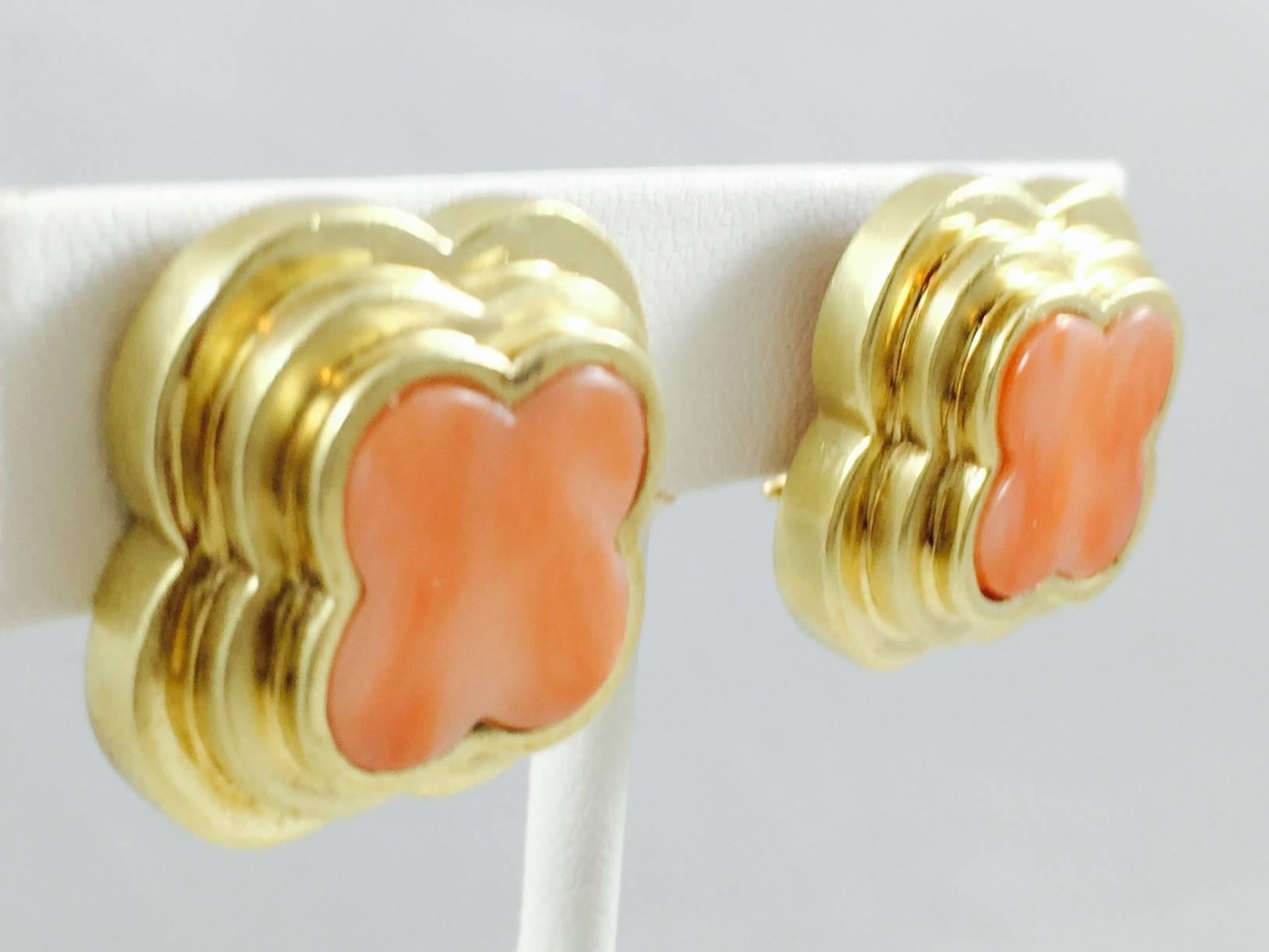 An excellent addition to any earring collection!  Beautifully crafted with clover shape step up design leading to a gorgeous clover shape coral center.  These earrings feature Omega backs and can easily be converted to pierced.  Coral color is truly