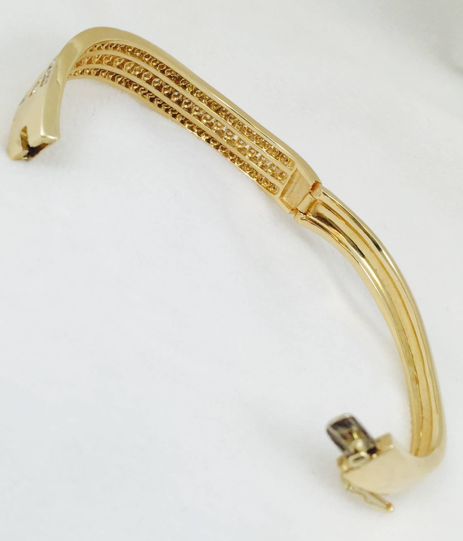 Contemporary Three Row Diamond Gold Waves Bangle Bracelet For Sale