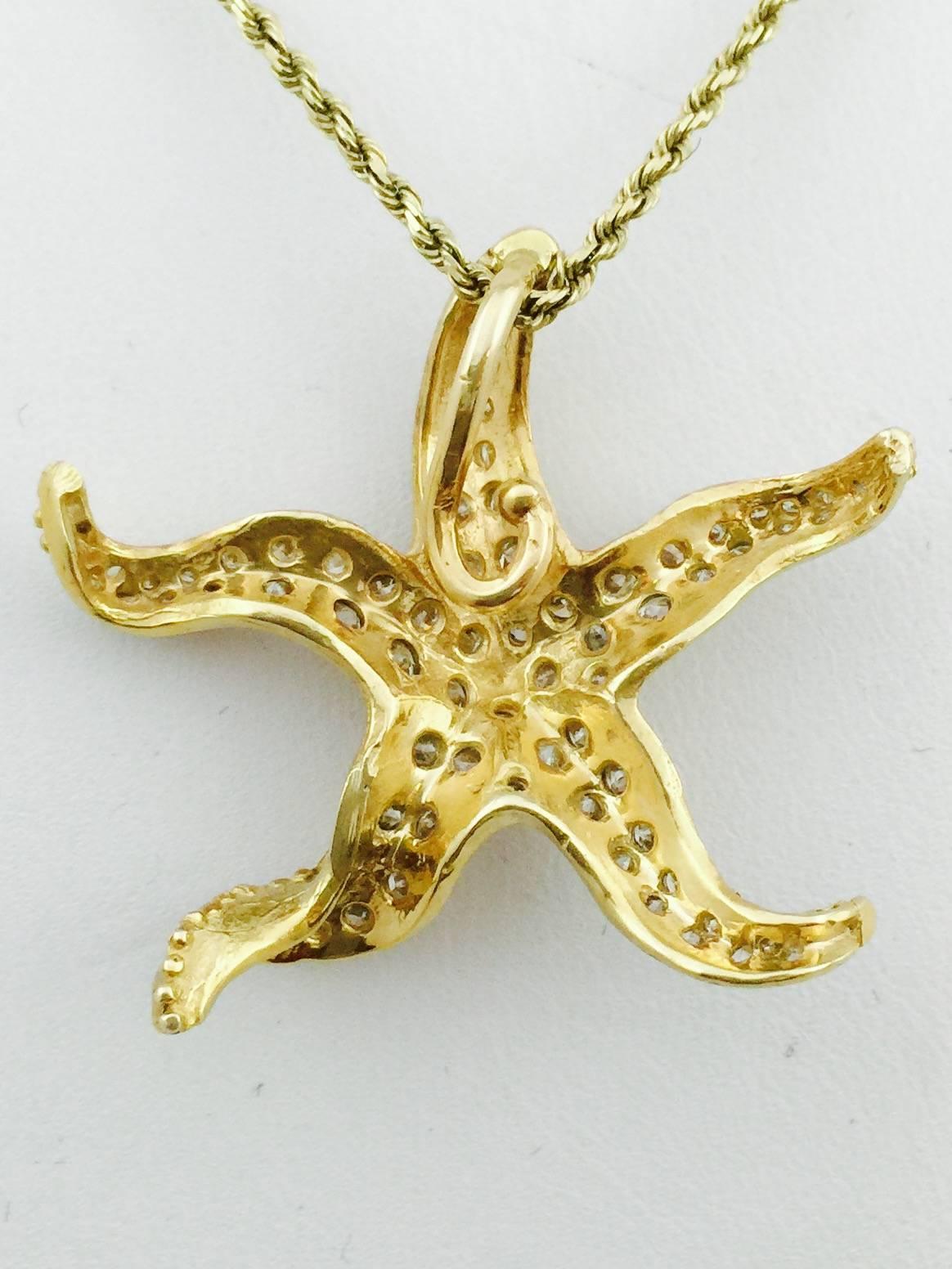 A beautifully detailed 18 karat yellow gold dimensional starfish encrusted in prong set brilliant cut diamonds having H color, VS1 clarity and an approximate total weight of 2.90 carats.  Knobby details, twists and curves bring life to this sea