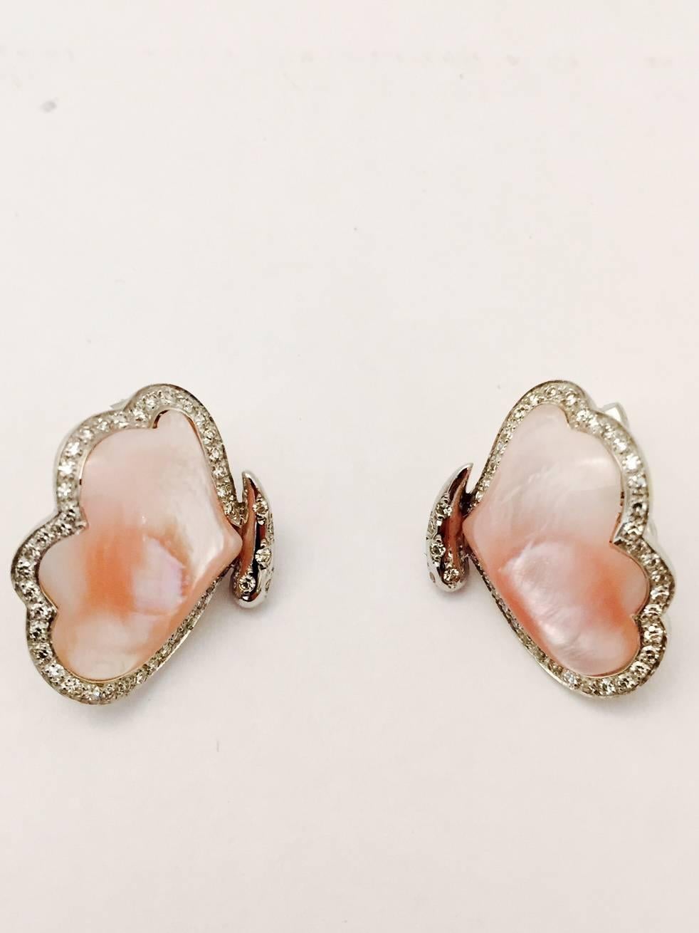 Ah, the butterfly!  A transformation signifying change.  These stunning Omega back clip on earrings are meticulously crafted with custom cut and polished pink agate forming the butterfly wings.  Intricately detailed with micro pave brilliant cut