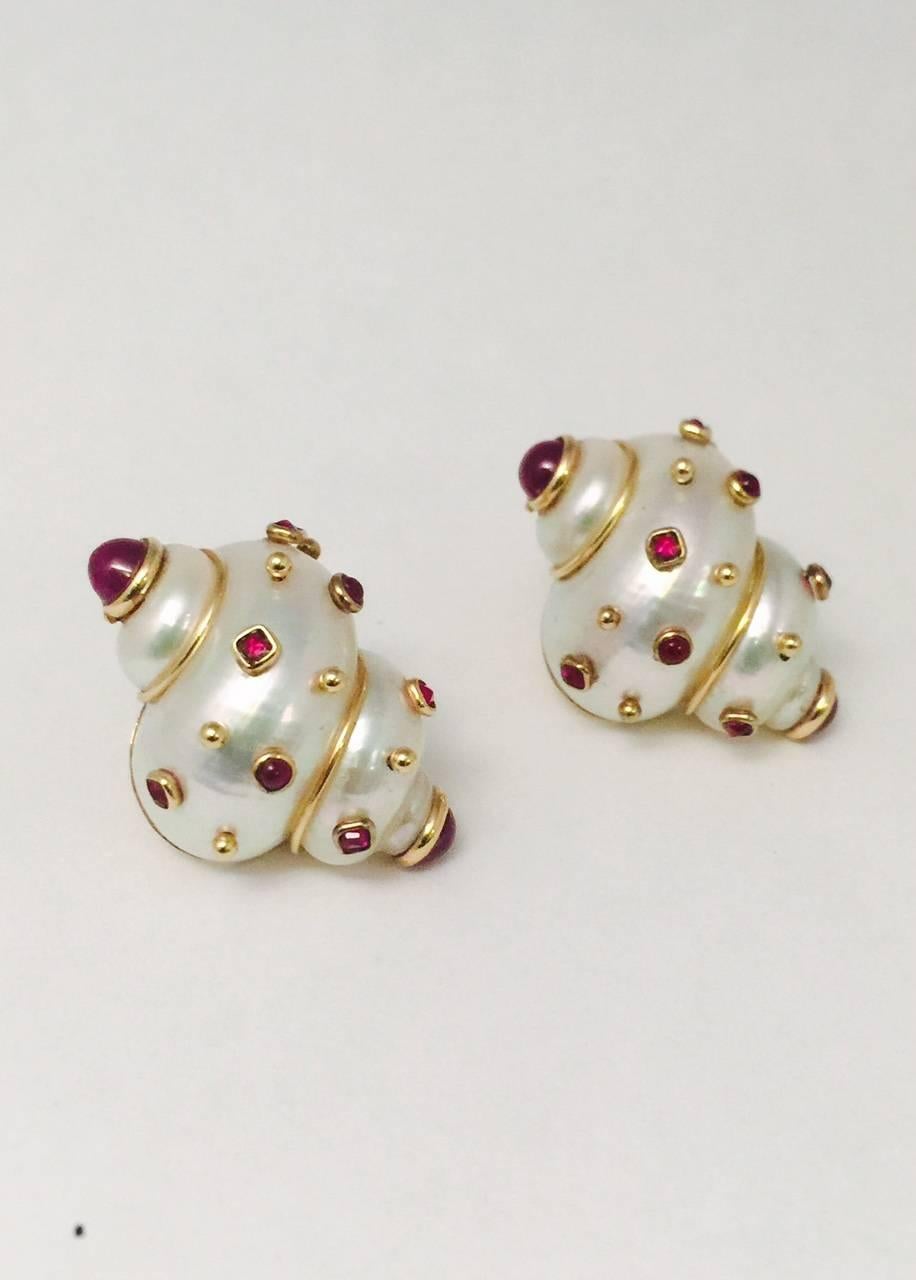 Transposing her love of nature: shells, leaves, animals, into fine jewelry for discriminating buyers, has made Maz such a popular designer.  These gorgeous clip on earrings, fabricated in 14 Karat yellow gold, feature gold beads and bezel set,