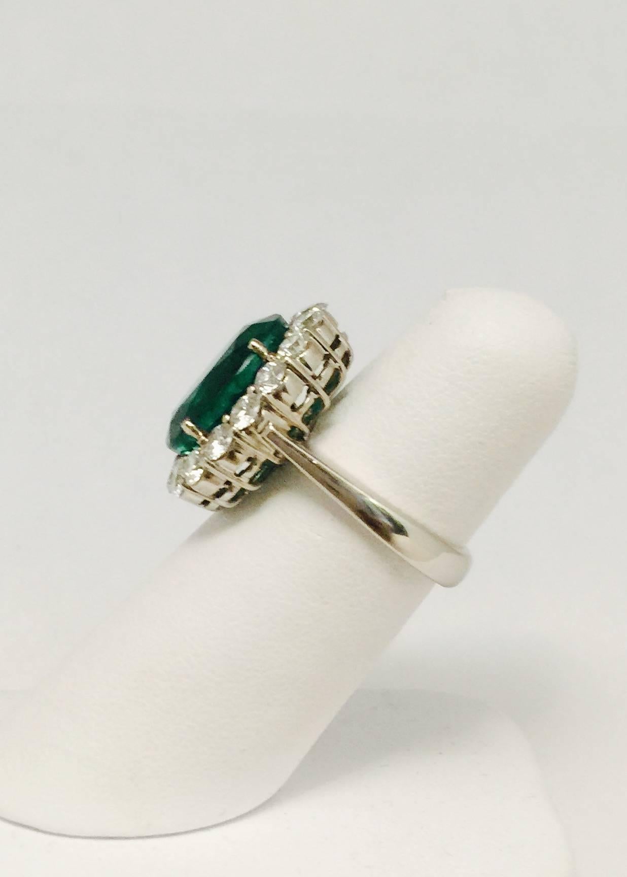 Captivating Colombian Emerald White Gold Framed by White Diamonds In Excellent Condition For Sale In Palm Beach, FL