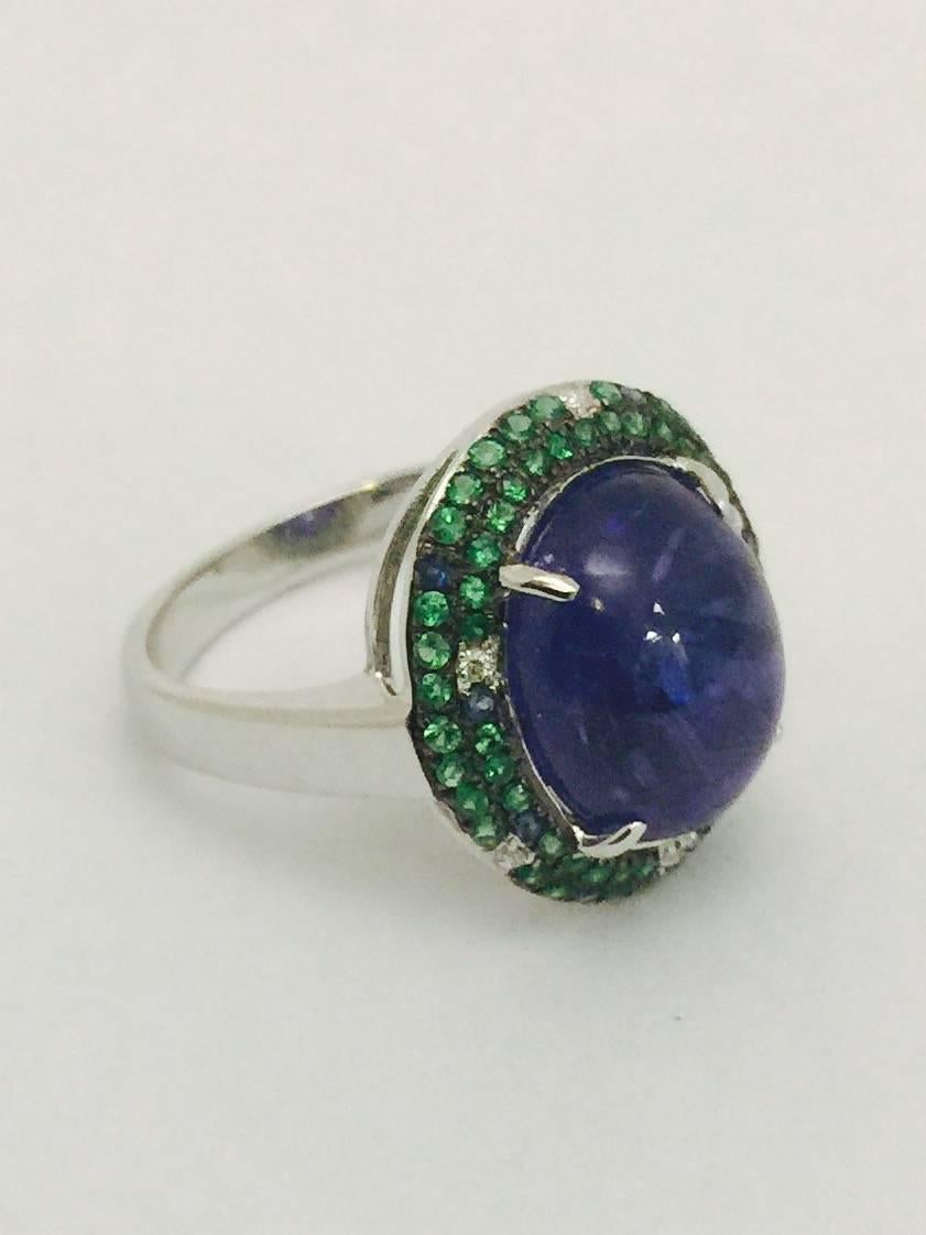 Coined "Tanzanite" in 1970 by Tiffany & Co, this stone can be mistaken for a Kashmir sapphire!  Larger stones easily sell for $2000 per carat today due to decline in mining finds.  This fabulous cabochon tanzanite weighs 6.66 carats. 