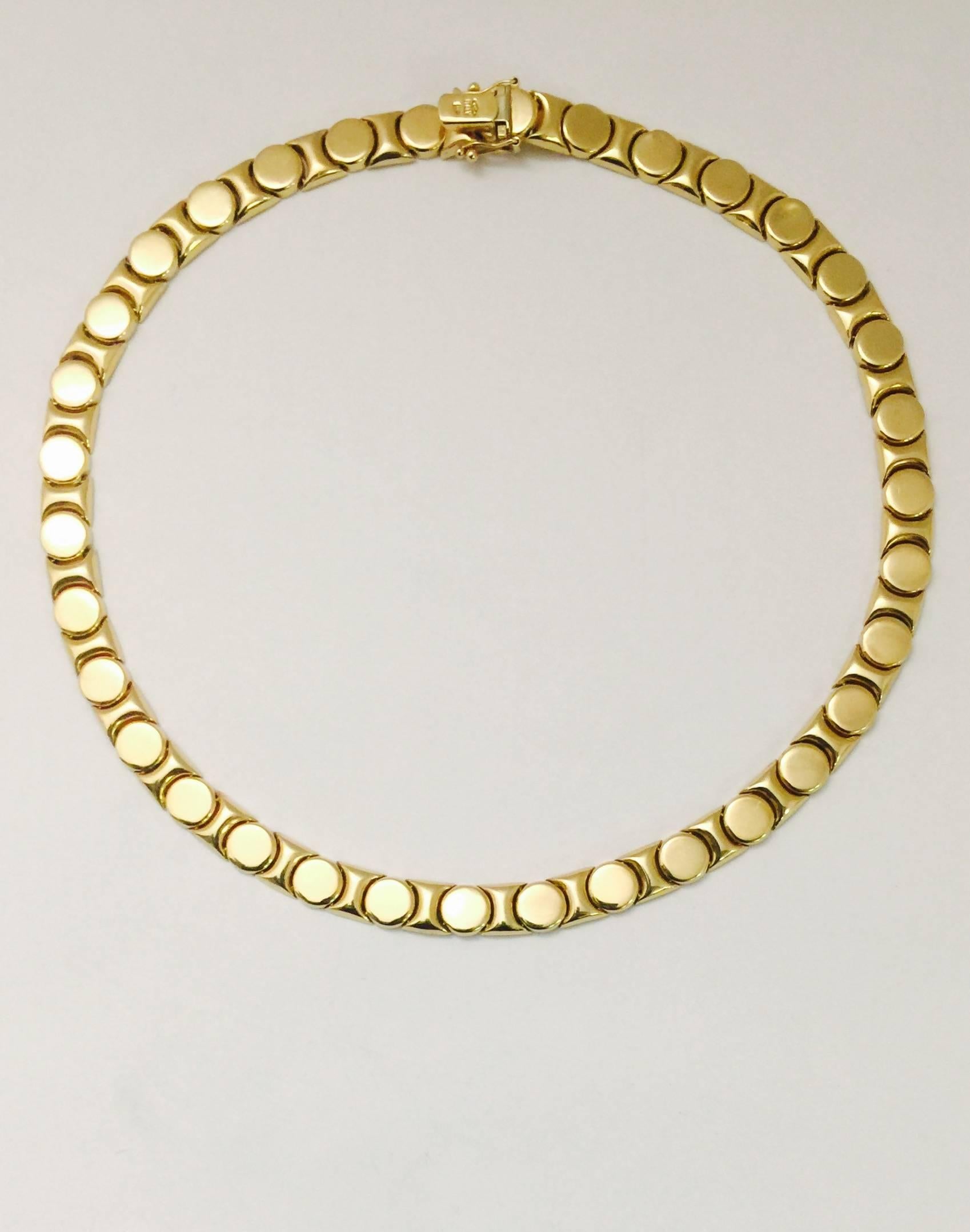 This will be your "go to" necklace.  Jeans, little black dress, whatever!  Nail heads are reminiscent of a famous jewelers bracelet!  Elegantly simple yet very eye catching.  Choker length of 16".  A wonderful piece to add to your