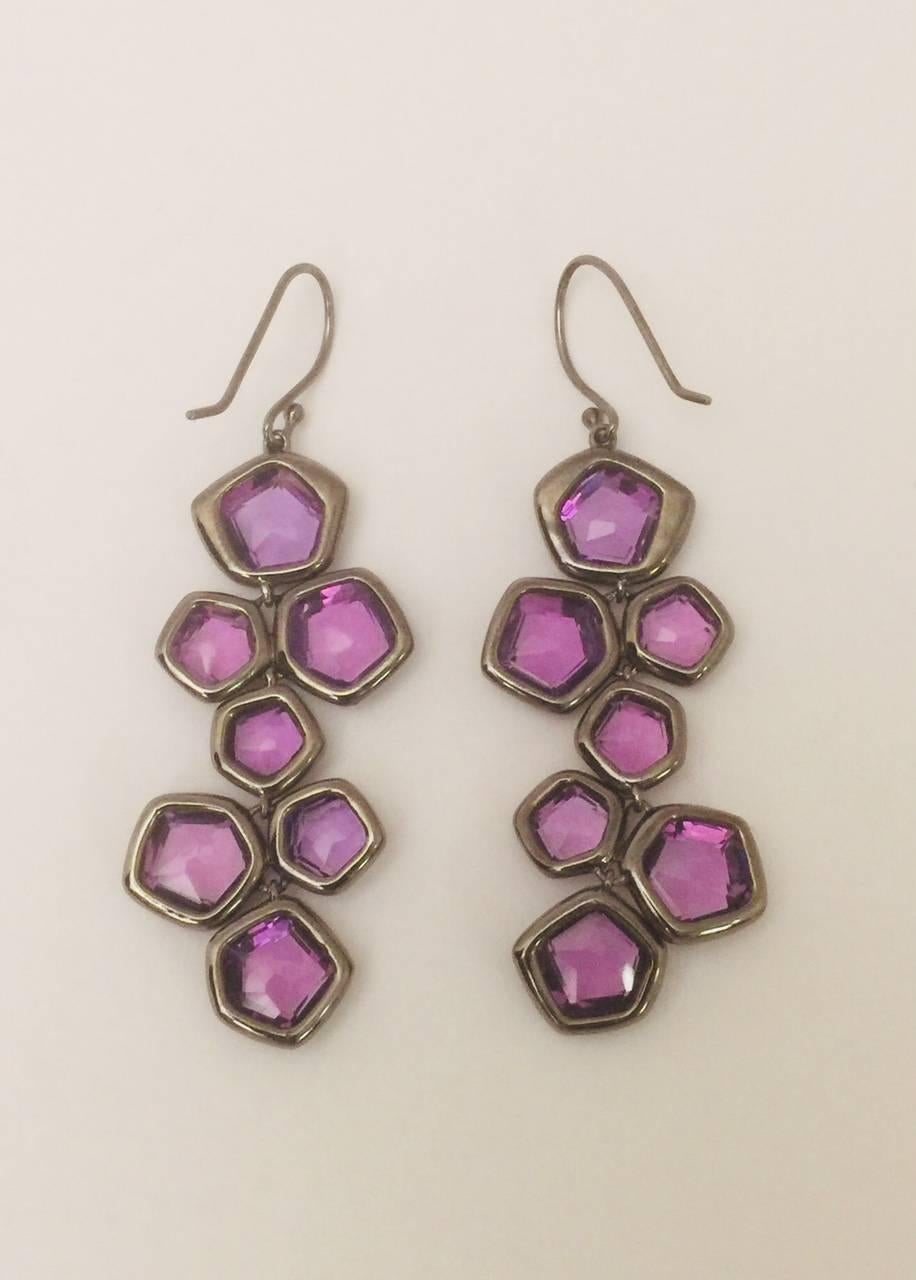 Ippolita has reached new heights of popularity lately!  Unique, fresh and contemporary designs are eye catchers!  These fabulous dangle earrings begin with black rhodium sterling silver.  Beautifully different 5 sided, faceted, matched, bezel set