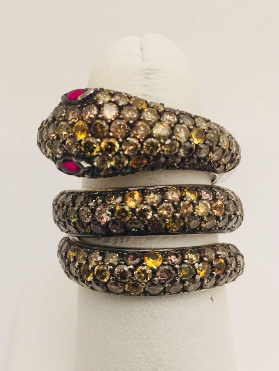 Snakes take a major role in many of the world's myths and legends.  Early on, snakes vaulted into the forefront of jewelry design and recently have become a celebrity craze.  Beautifully crafted in 18 karat white gold, this striking serpent is