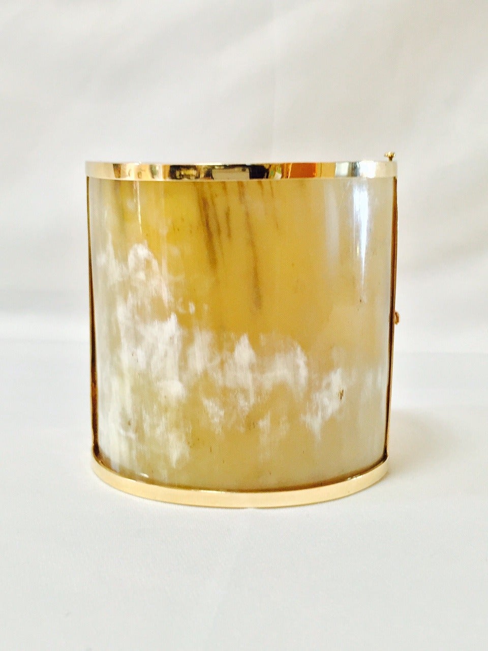 Everything old is new again!  Take a cherished Italian shell cameo and fabricate an 18K yellow gold frame.  Custom cut Buffalo Horn forms the 2 3/4