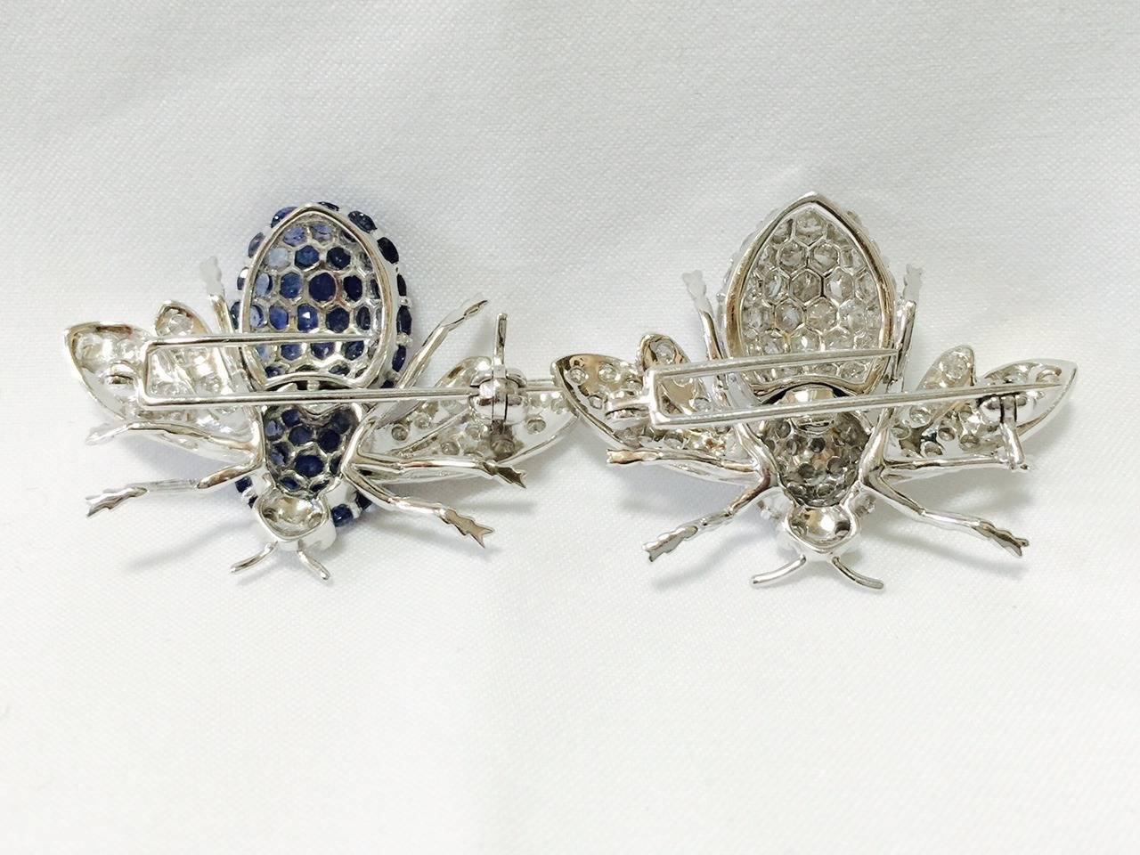 A Pair of  Diamond Sapphire Bee Brooches 1