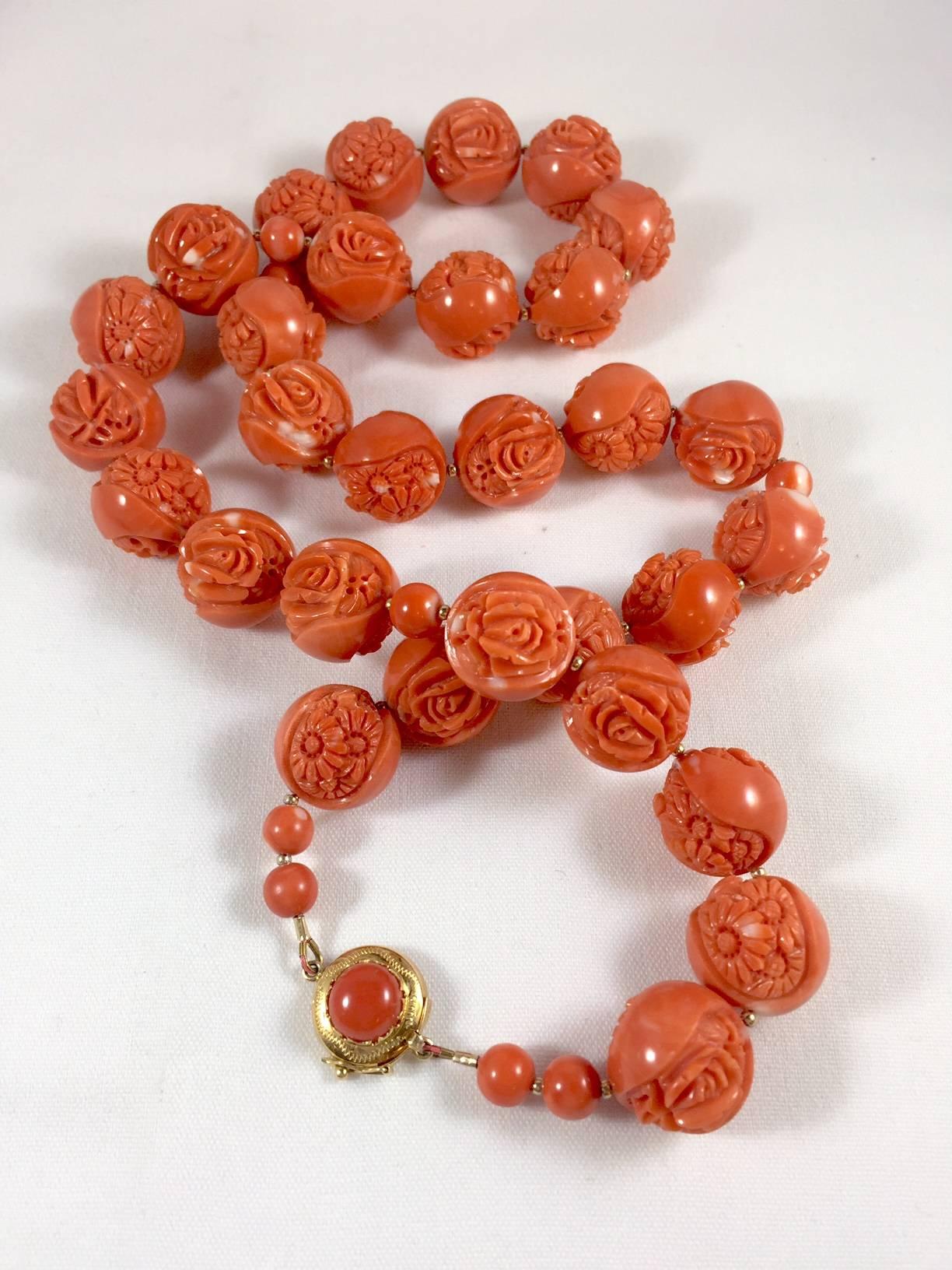 An absolutely incredible find!  Twenty eight inches of carved Momo coral beads in an impressive 22mm size.  Each bead is a work of art!  Like pearls, coral is organic and Momo coral displays streaks of white only found in Nature.  Securely fastened