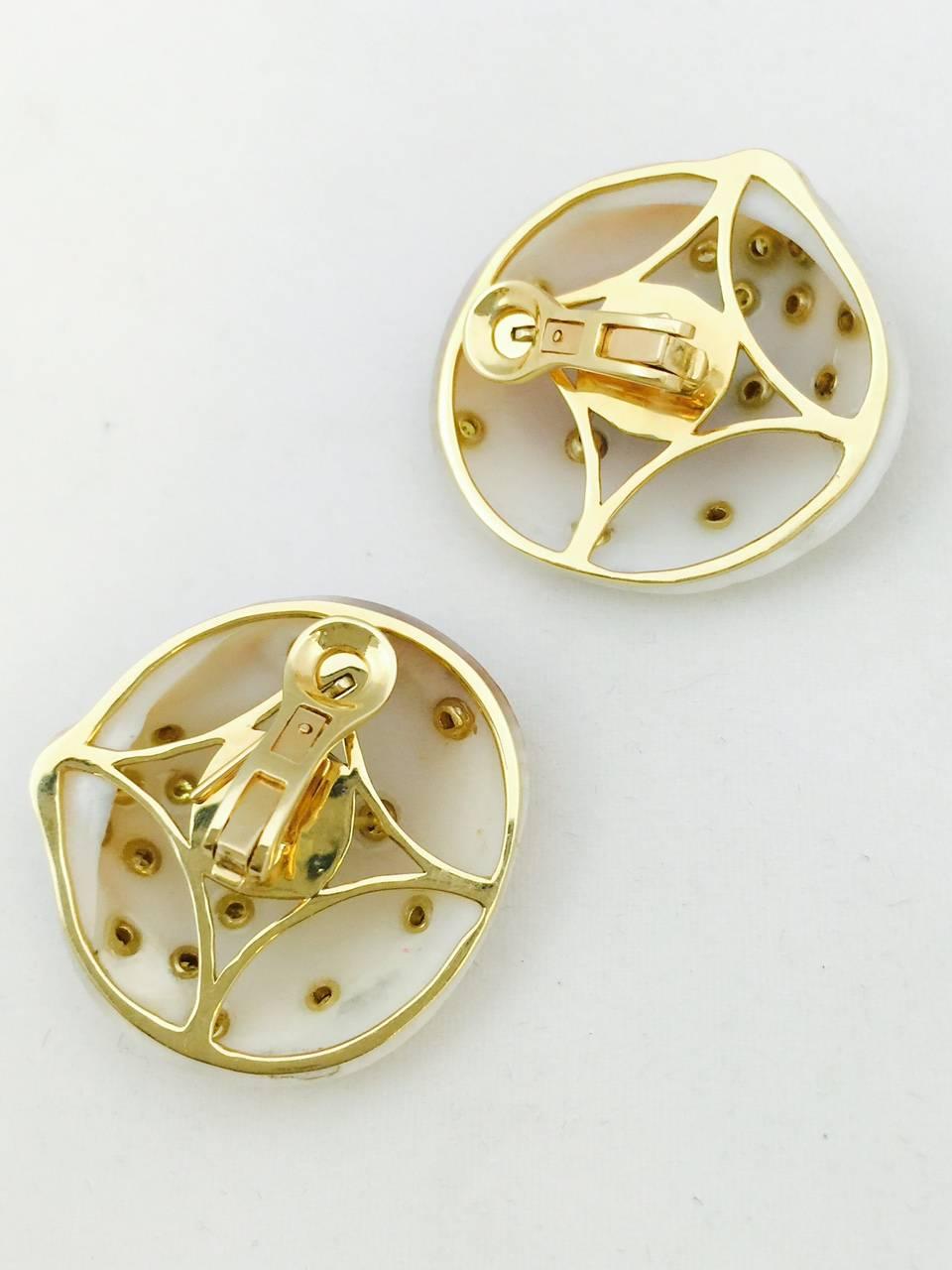 Contemporary Fancy Yellow Diamond gold Shell Earrings For Sale