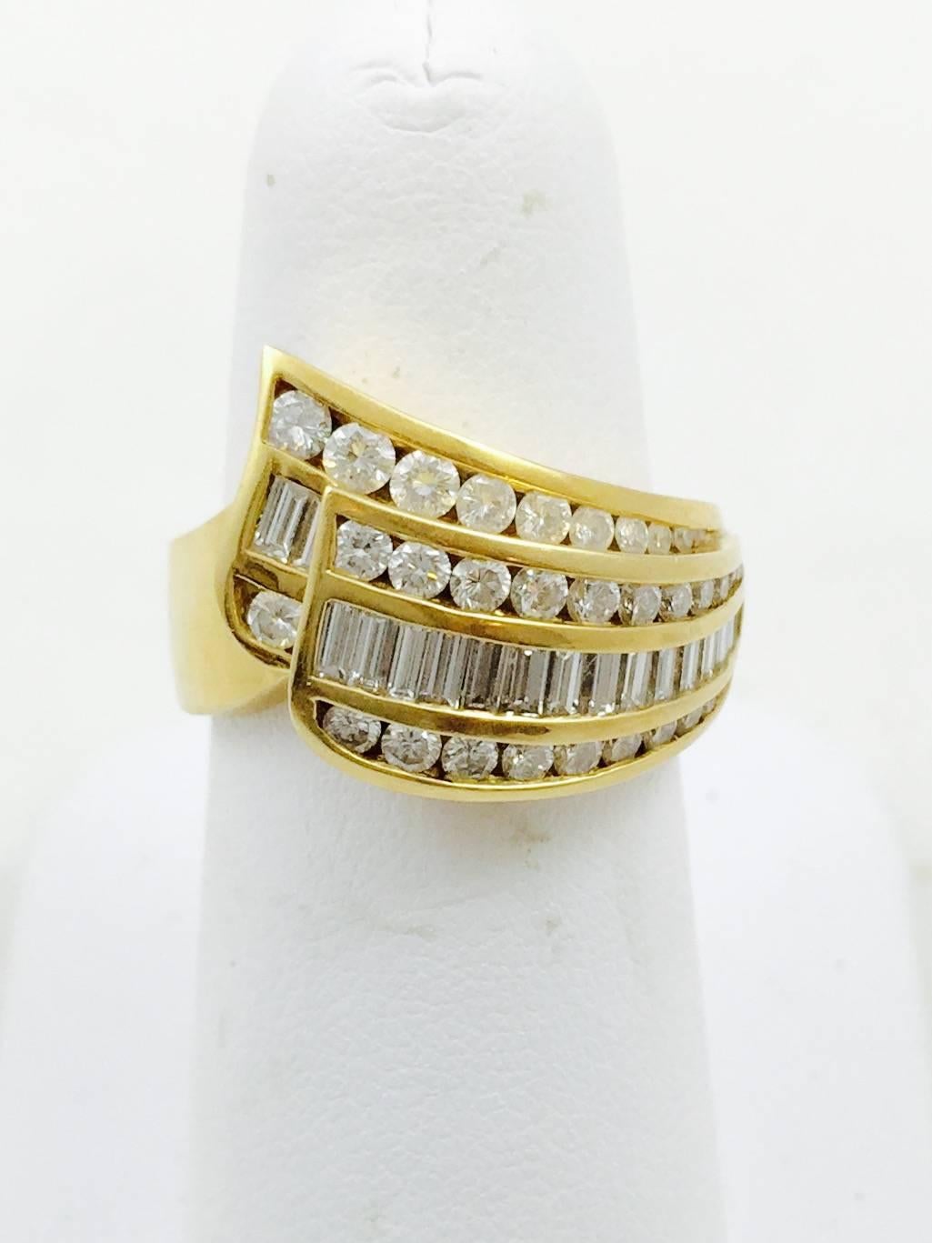 Since 1976, clients have adored the sophisticated designs of Charles Krypell.  His styles are timeless yet contemporary.  Magnificently represented in 18 karat yellow gold is a by-pass design ring artfully swirled and filled with diamonds on one