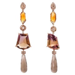 Pendants d'oreilles uniques en leur genre en or brossé, diamants 0,70 carats, ametrine et citrine