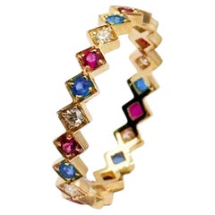Anello Eternity in oro giallo 18 carati con diamanti, rubini e zaffiri, di Rossella Ugolini