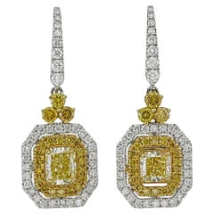Certifié GIA (1,24 ct.) Boucles d
oreilles fantaisie en or blanc 18 carats avec diamant jaune intense