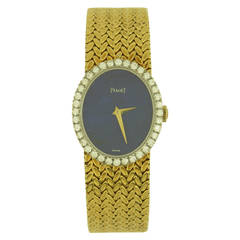 Piaget Lady's Yellow Gold Lapis Lazuli Dial Diamond Bezel Wristwatch
