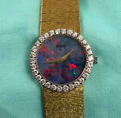Piaget Ladies Yellow Gold Diamond Bezel Opal Dial Wristwatch