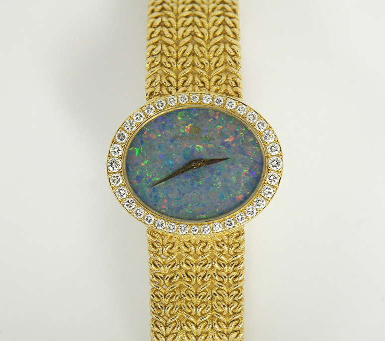Bucherer Lady's Yellow Gold and Diamond Bracelet Watch with Black Opal Dial