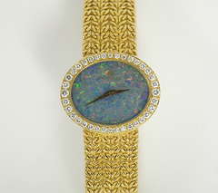 Vintage Bucherer Lady's Yellow Gold and Diamond Bracelet Watch with Black Opal Dial