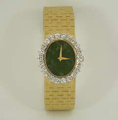 Piaget lady's Yellow Gold and Diamond Bracelet Watch with Jade Dial circa 1970s