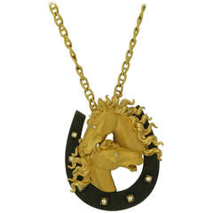 Pendentif en or avec diamants sur le thème du cheval Carrera y Carrera