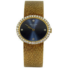 Patek Philippe Lady's Yellow Gold and Diamond Bracelet Watch with Blue Dial